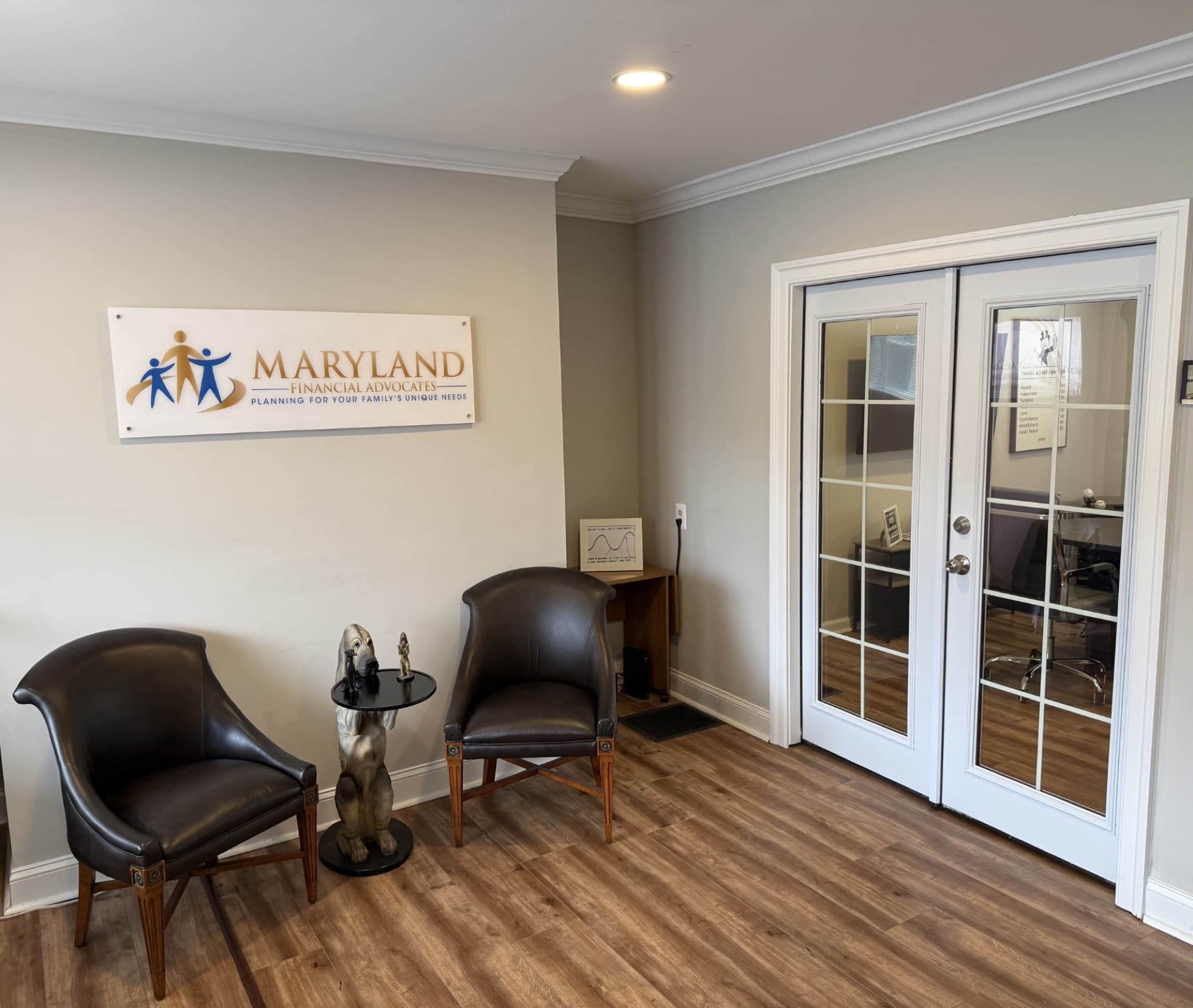 Lobby at Maryland Financial Advocates, with the firm's sign on the wall